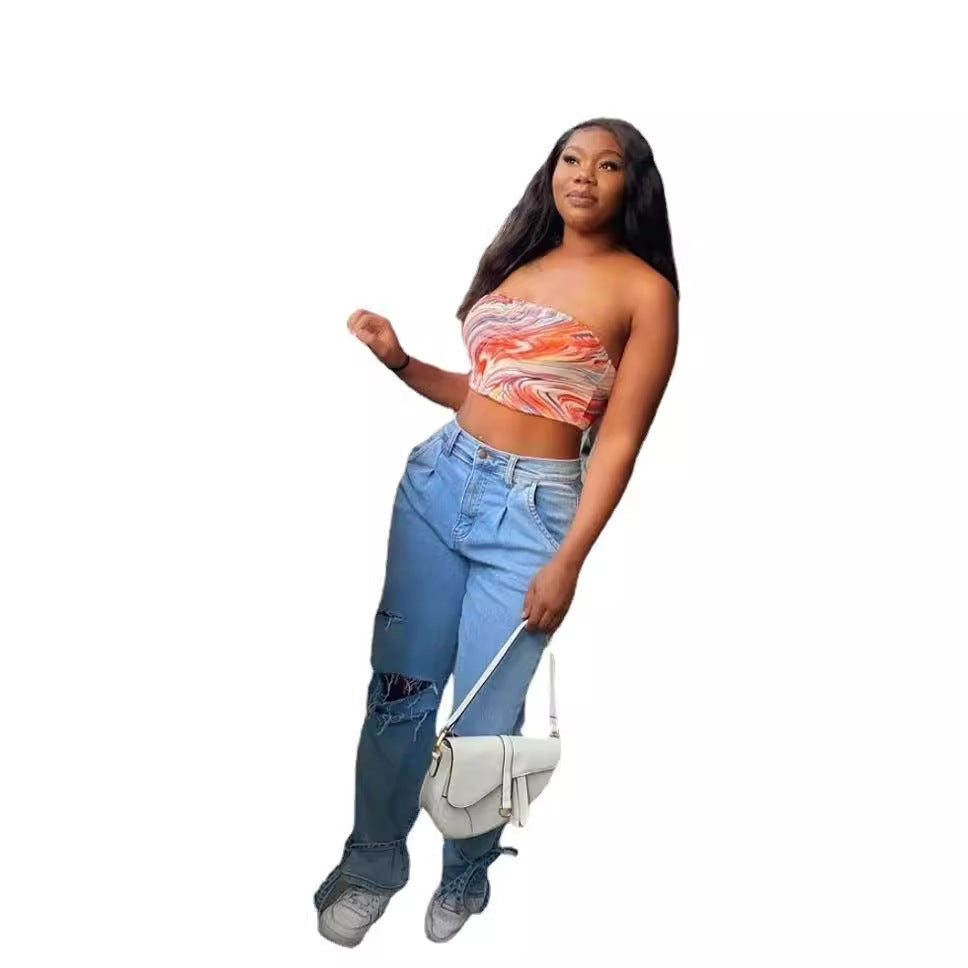 Jeans da donna effetto strappato dal taglio ampio e moderno, dall’eleganza disinvolta