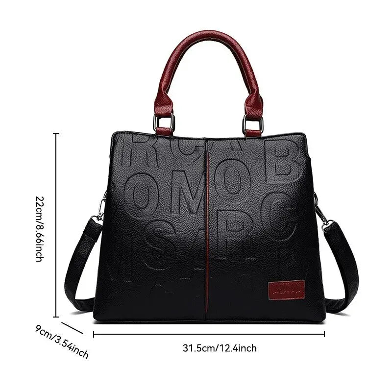 Drune – Damenhandtasche aus weichem Leder mit geprägtem Buchstabendesign