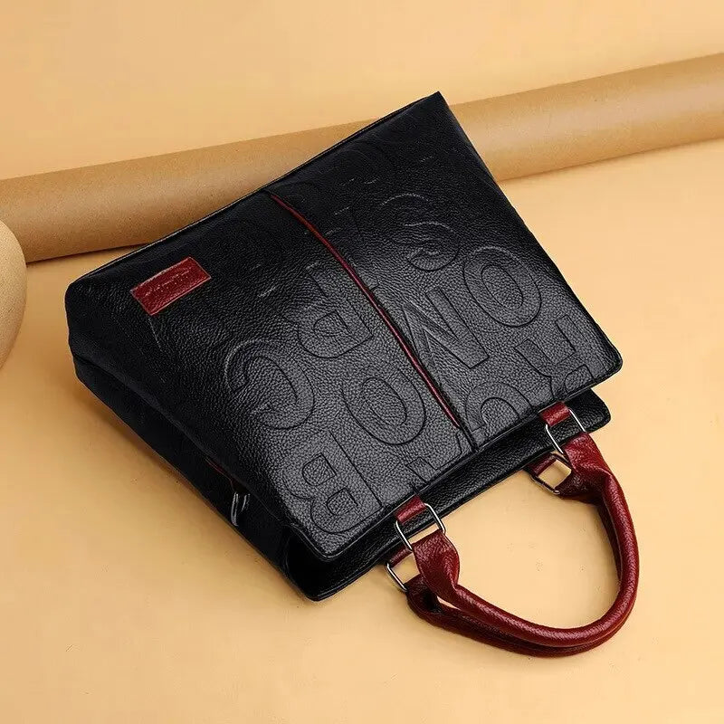 Drune – Damenhandtasche aus weichem Leder mit geprägtem Buchstabendesign