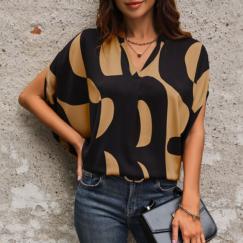 Damen Bluse im modernen abstrakten Design mit V-Ausschnitt und kurzen Ärmeln Drune