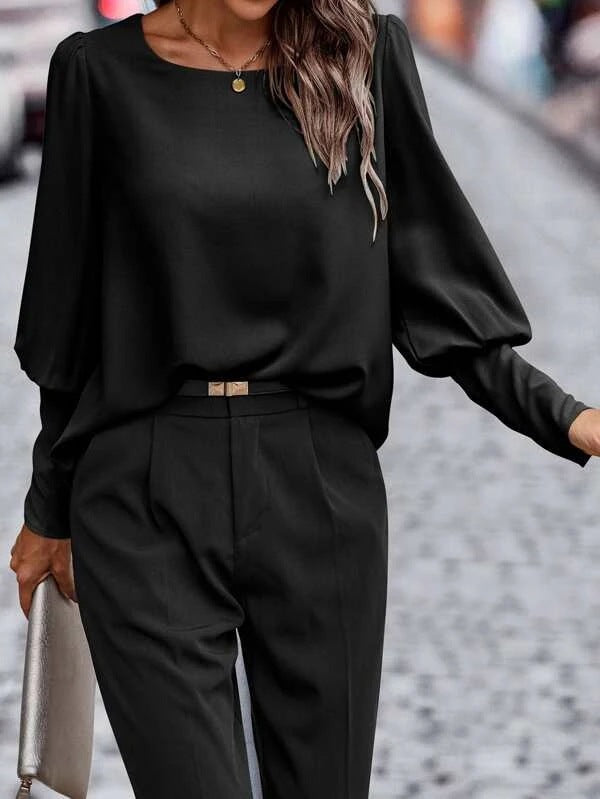 Damen Bluse mit eleganten Puffärmeln und fließendem Stoff Drune